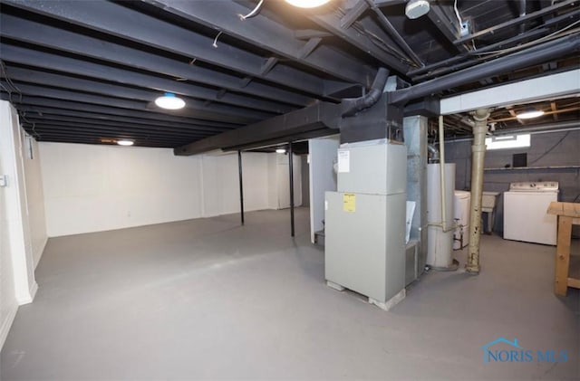 basement with heating unit and gas water heater