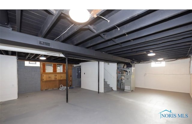 basement with heating unit