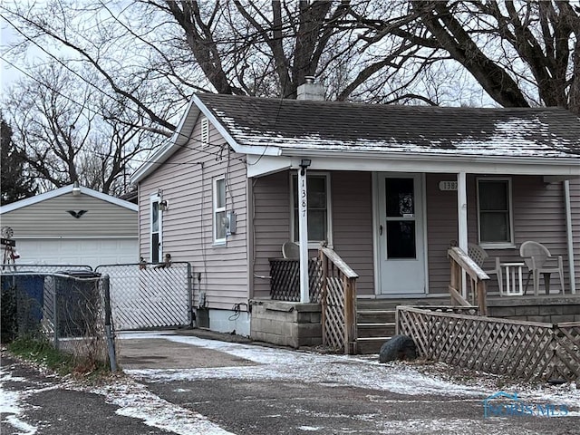 view of front of property with an outbuilding and a garage