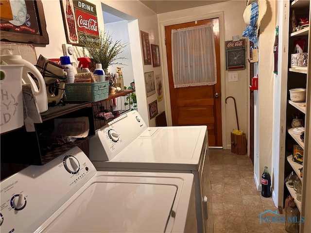 laundry area featuring washing machine and dryer