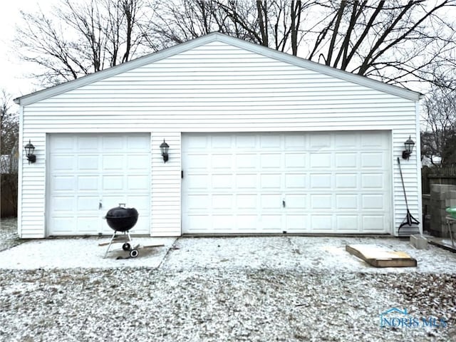 view of snow covered garage