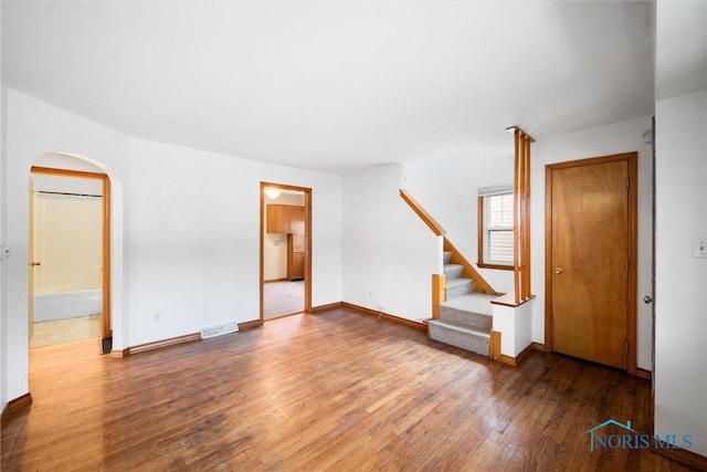 empty room featuring wood-type flooring