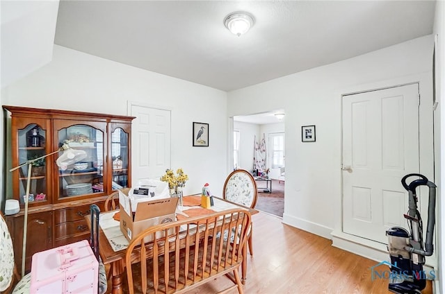 dining room featuring light hardwood / wood-style floors