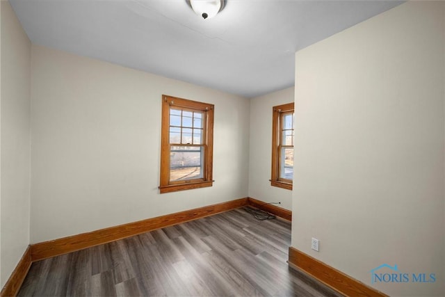 empty room featuring hardwood / wood-style floors