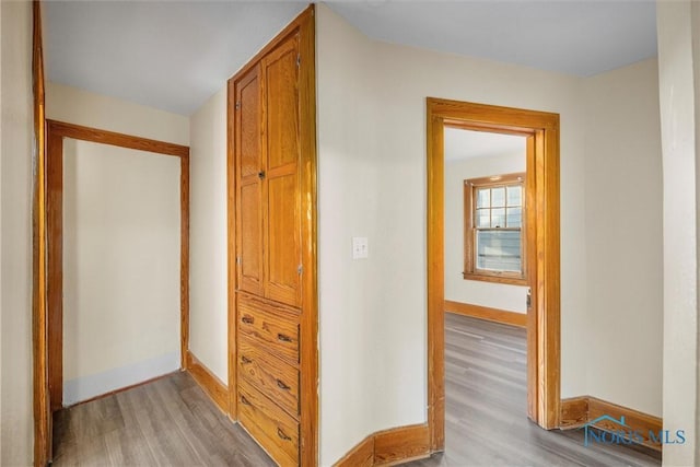 hallway featuring light hardwood / wood-style flooring