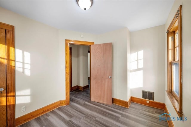 interior space with hardwood / wood-style floors