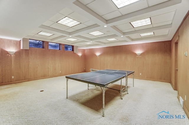 game room featuring beamed ceiling, wood walls, light colored carpet, and coffered ceiling