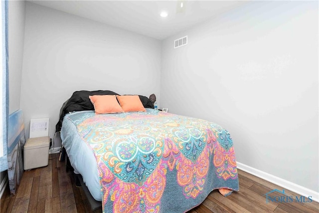 bedroom featuring recessed lighting, baseboards, visible vents, and wood-type flooring