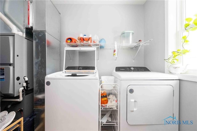 laundry room with laundry area and washer and dryer