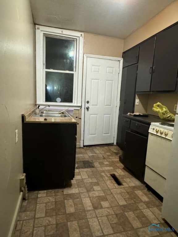 kitchen with sink and range