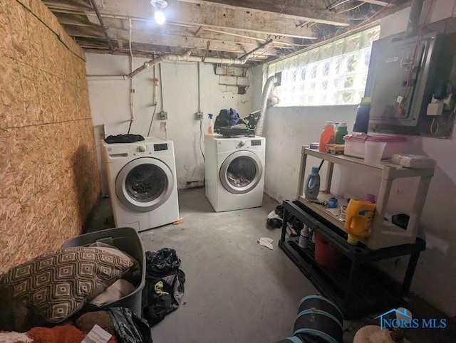 laundry area featuring independent washer and dryer and electric panel