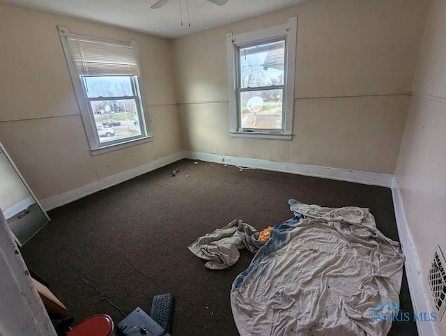 empty room featuring ceiling fan