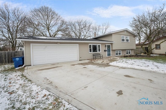 tri-level home featuring a garage