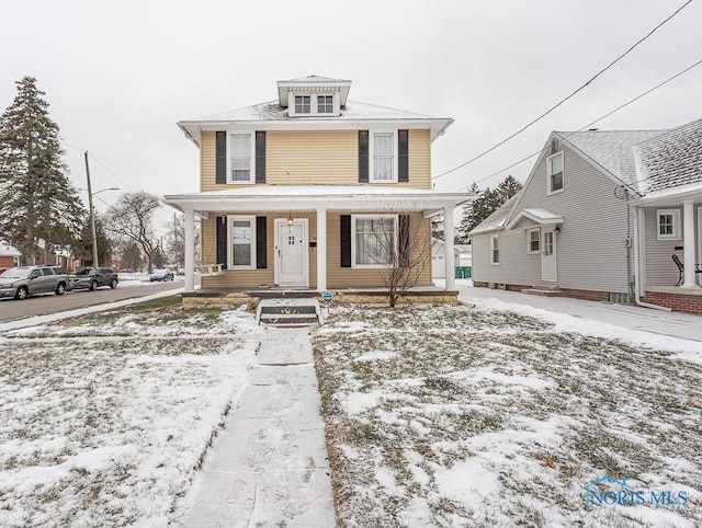 view of property with a porch