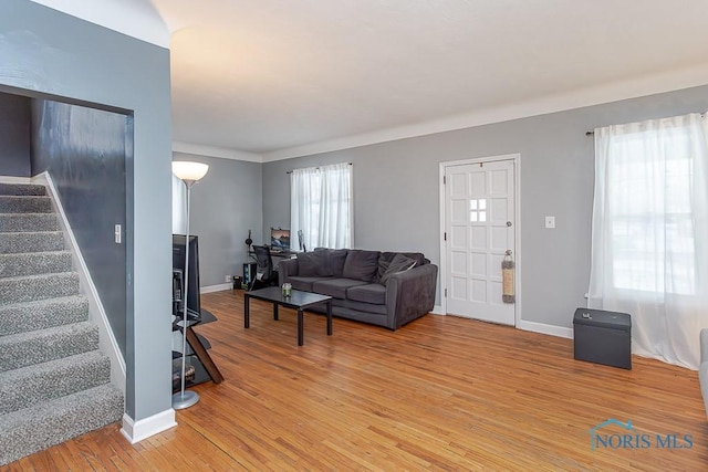 living room with light hardwood / wood-style flooring