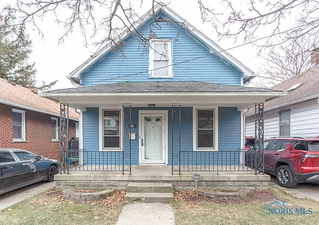 bungalow-style home featuring a porch