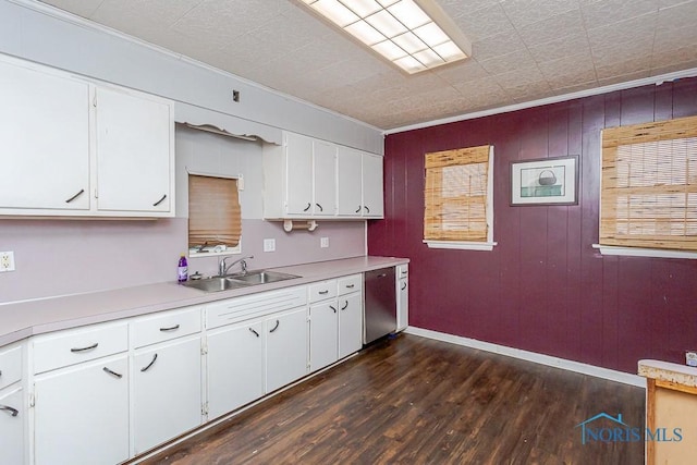 kitchen with white cabinetry, stainless steel dishwasher, and sink