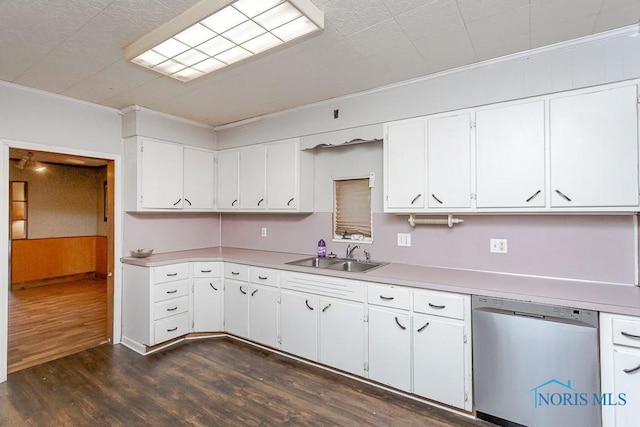 kitchen with dishwasher, sink, ornamental molding, dark hardwood / wood-style flooring, and white cabinetry