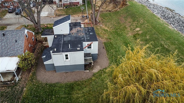 bird's eye view with a water view