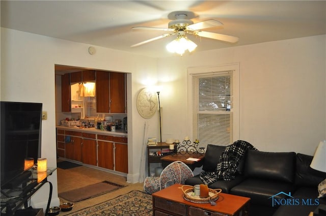 living room featuring ceiling fan