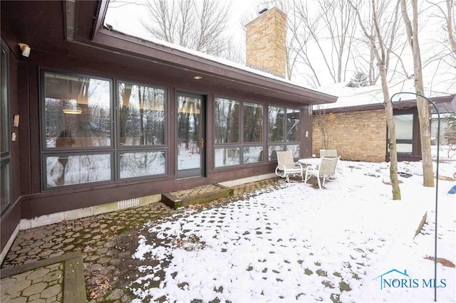 exterior space with a sunroom