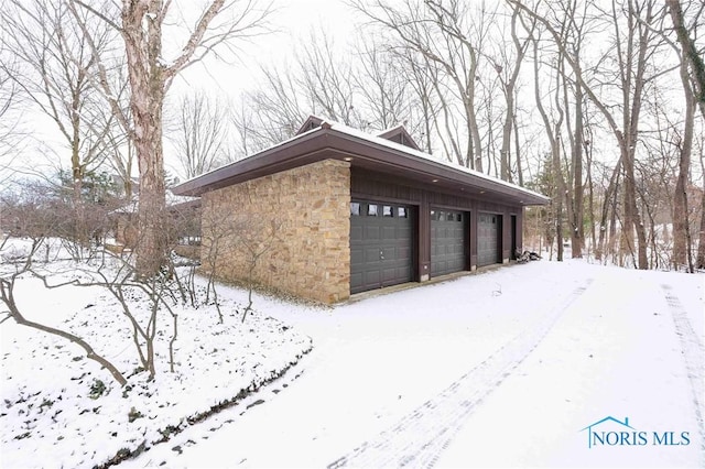 view of snow covered property