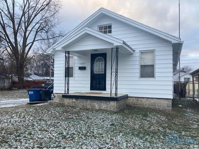 bungalow-style home with covered porch