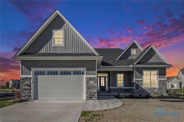 view of front of property featuring a garage