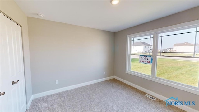 view of carpeted empty room