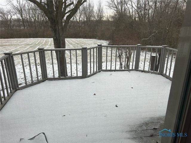 view of snow covered deck