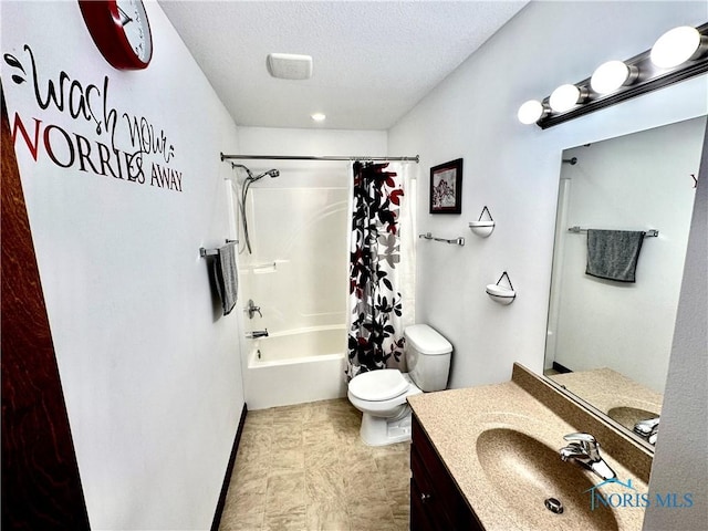 full bathroom featuring vanity, shower / bath combo, a textured ceiling, and toilet