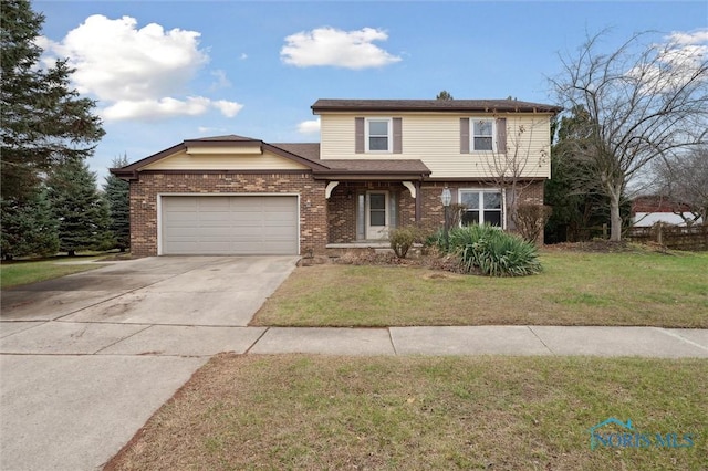 view of front property featuring a garage and a front lawn