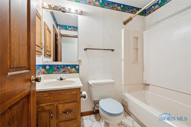 full bathroom with bathing tub / shower combination, tile patterned floors, vanity, and toilet