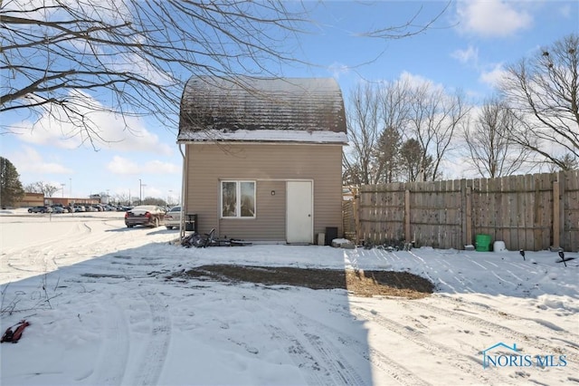 view of snow covered property