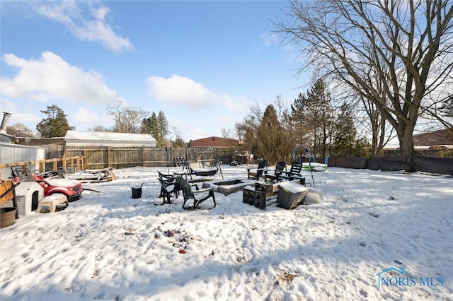 view of yard covered in snow