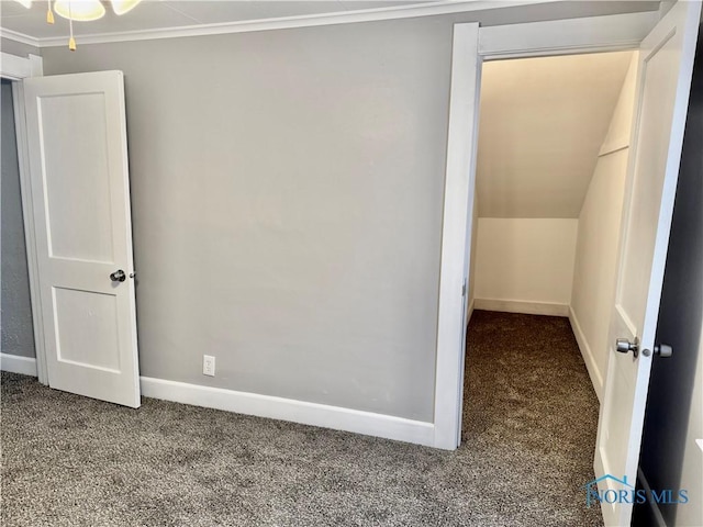 unfurnished bedroom with carpet and crown molding