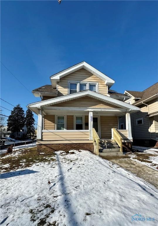 view of front of home with covered porch