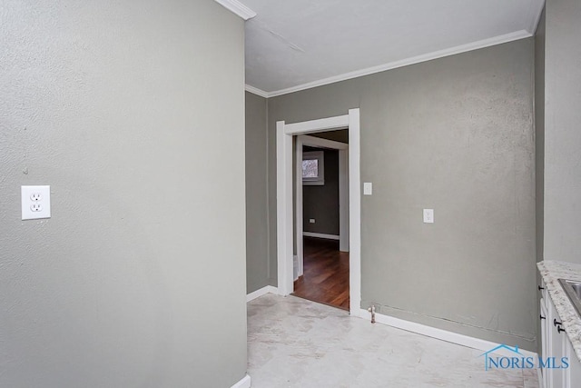 corridor featuring ornamental molding