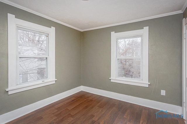 unfurnished room with hardwood / wood-style floors and crown molding