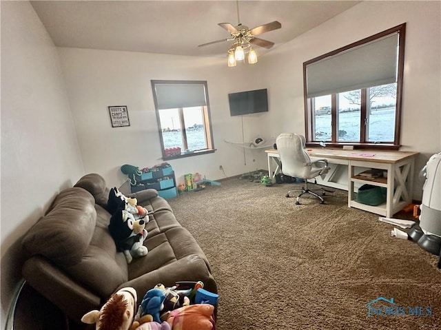 office area with carpet floors and ceiling fan