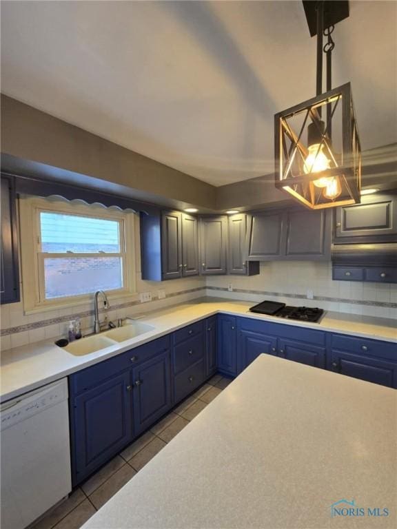 kitchen with black gas cooktop, blue cabinets, dishwasher, sink, and hanging light fixtures