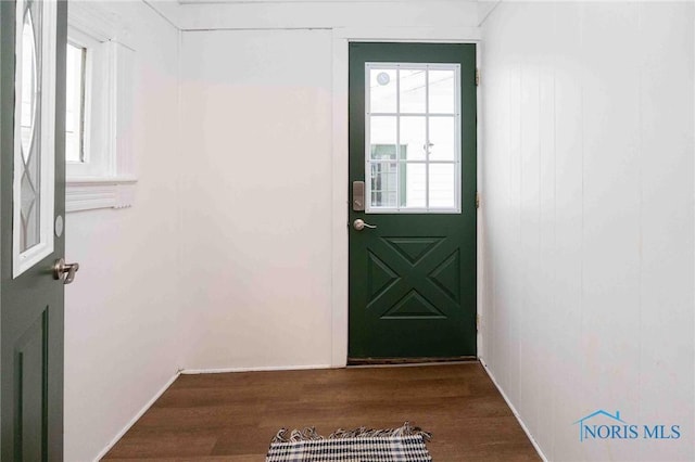 doorway to outside with hardwood / wood-style floors