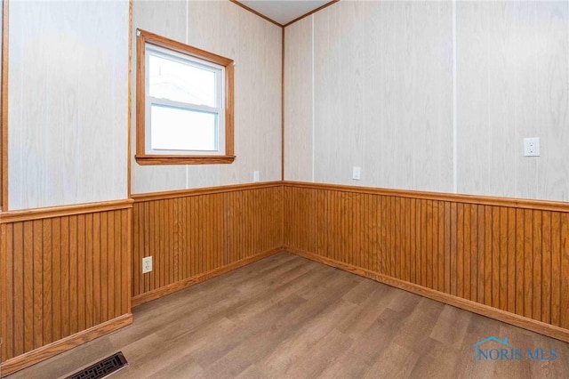 spare room with light wood-type flooring