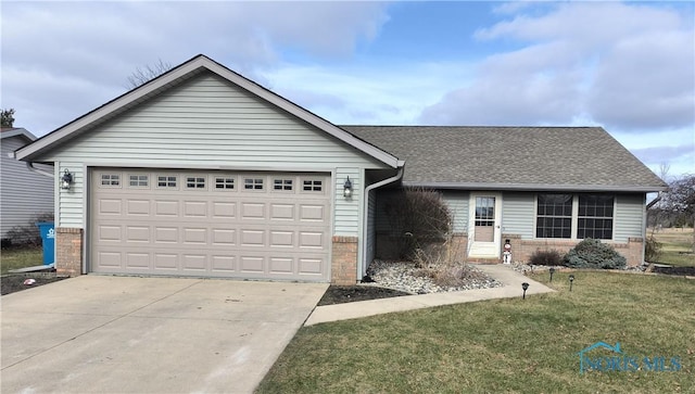 ranch-style home featuring a garage and a front yard