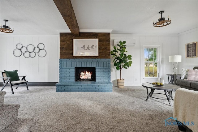 living room featuring beamed ceiling, carpet floors, a brick fireplace, and a wall mounted AC