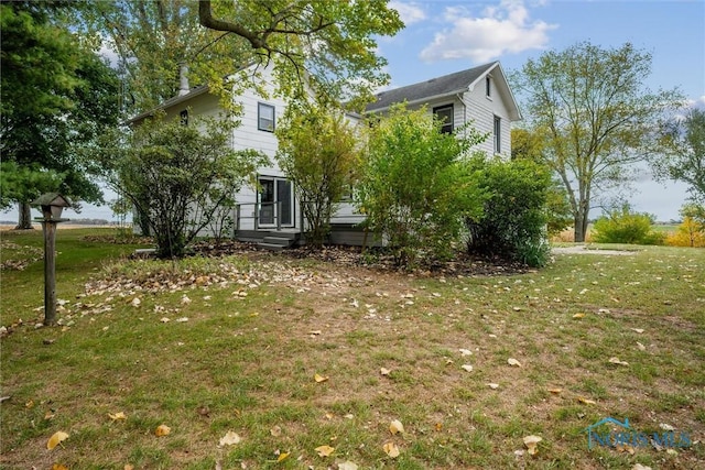 exterior space with a front yard