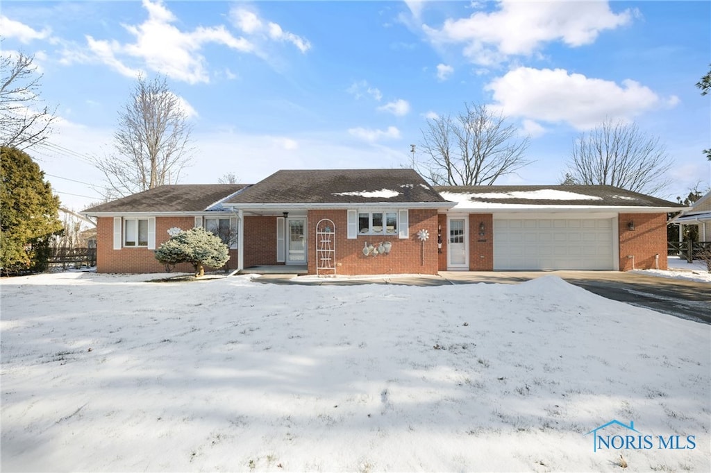 single story home with a garage