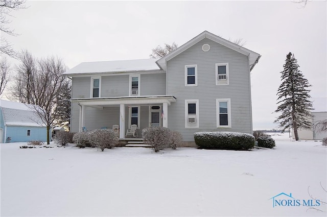 front of property featuring covered porch