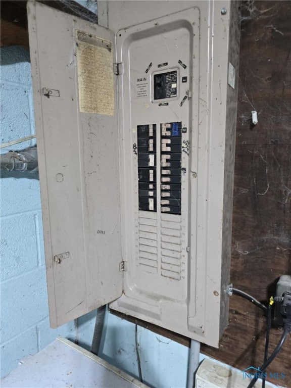 utility room featuring electric panel