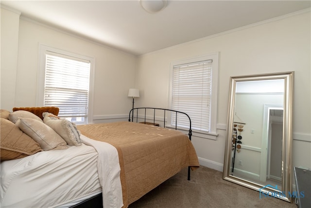 bedroom with dark colored carpet and crown molding